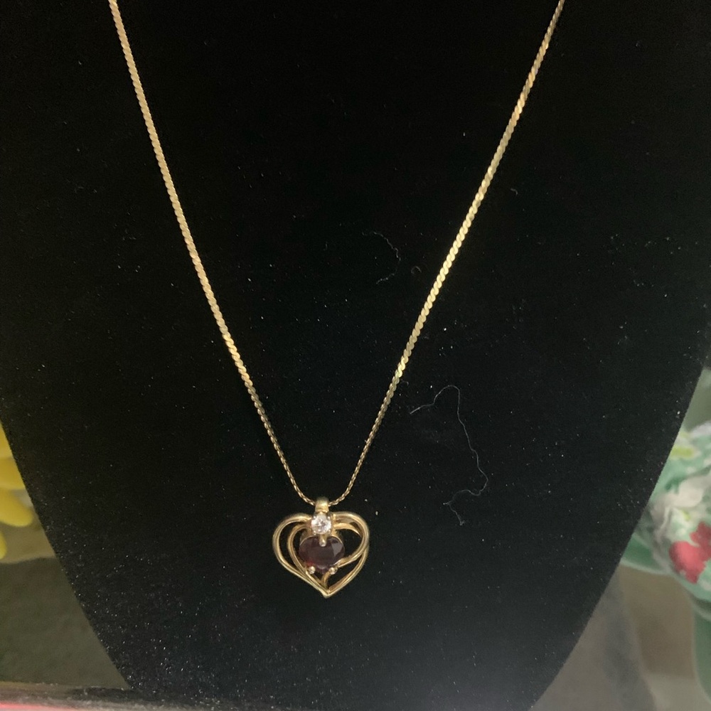 Small ruby in yellow gold. Not sure if ruby is real. It was my mother’s!